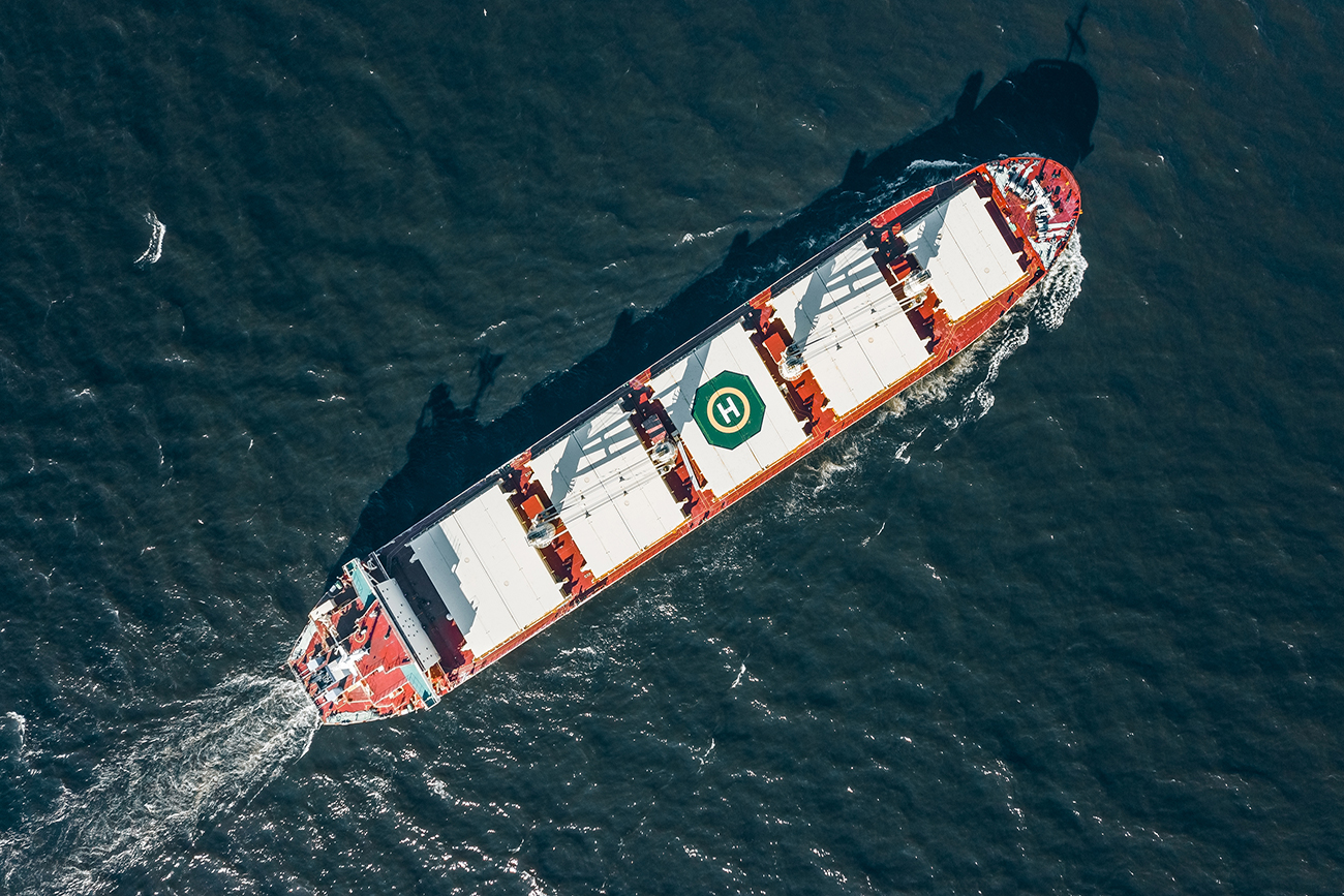 high-angled-view-of-cargo-ship-in-the-sea-2026-01-07-00-26-49-utc